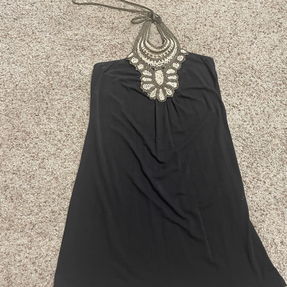 Cute knit summer dress that ties around neck.